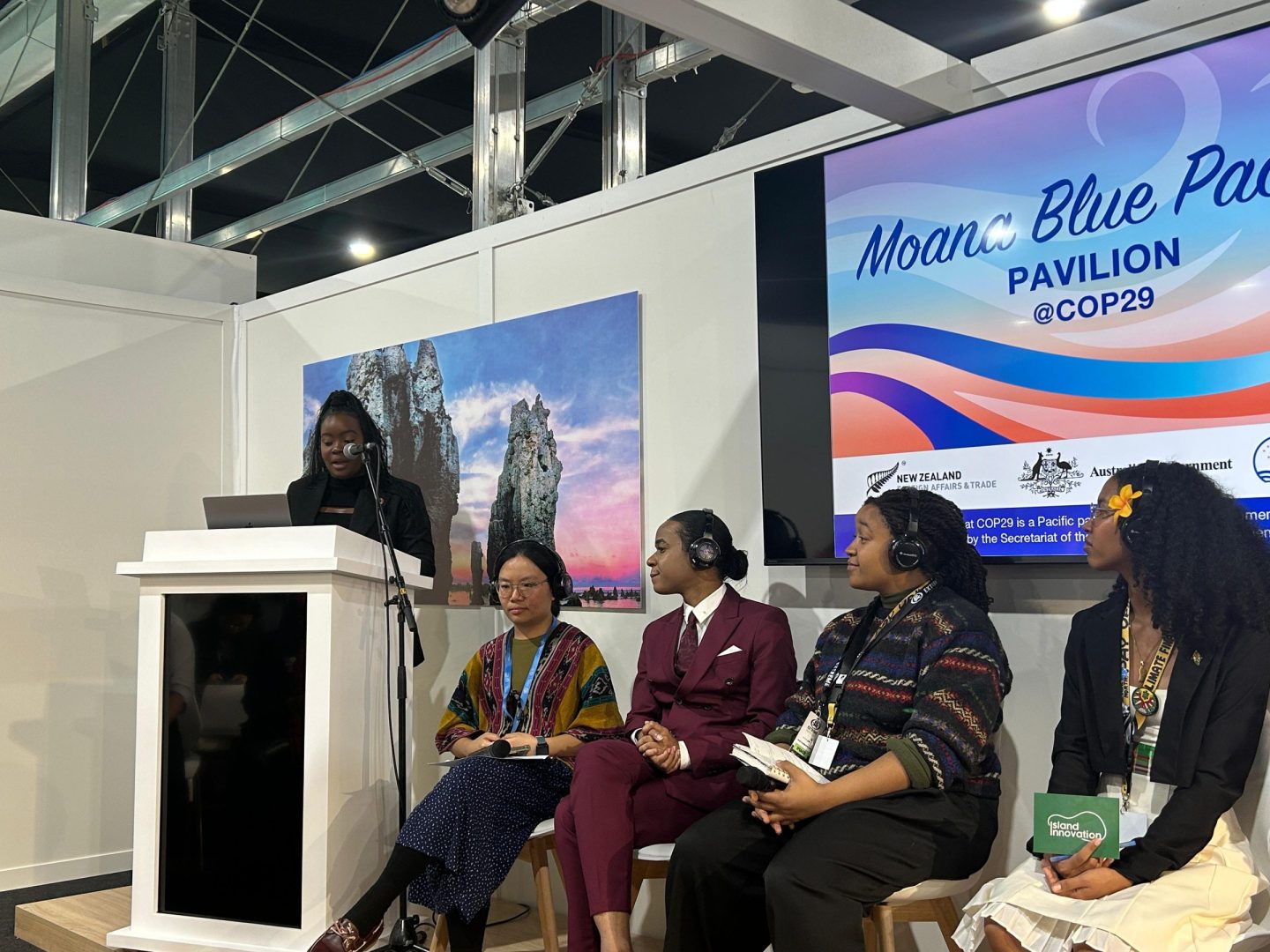 Speakers and moderator at the Moana Blue Pavilion during COP29